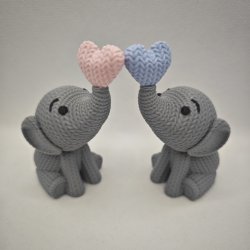 Siddende elefant med hjerte