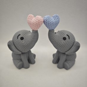 Siddende elefant med hjerte