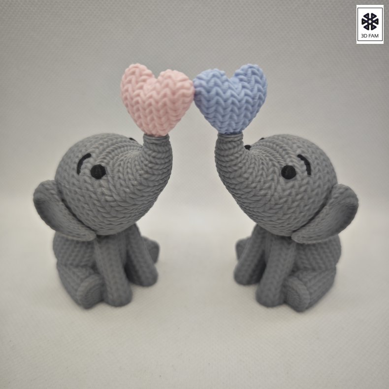 Siddende elefant med hjerte