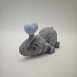 Liggende elefant med hjerte