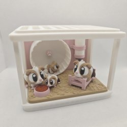 Hamsterbur med hamsterfamilie