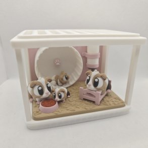 Hamsterbur med hamsterfamilie